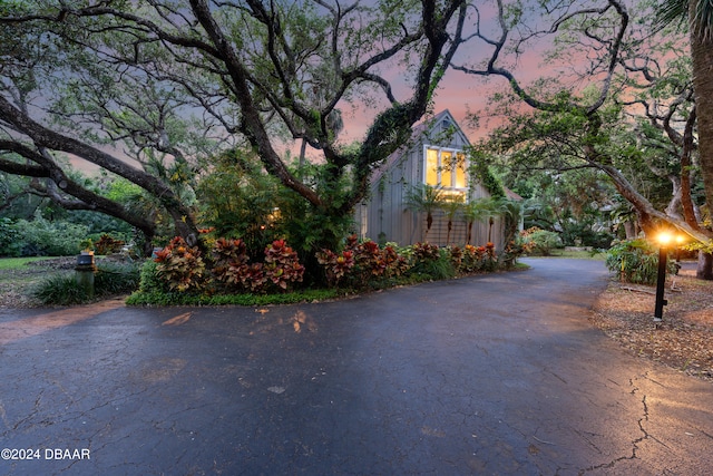 view of property exterior at dusk