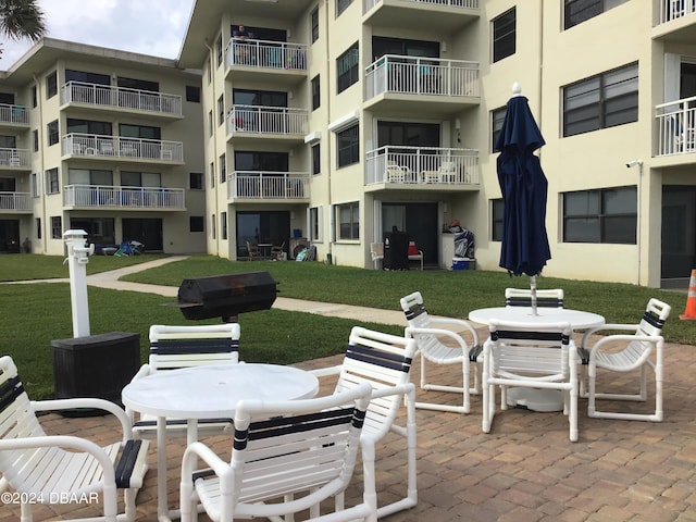 view of patio / terrace featuring a balcony