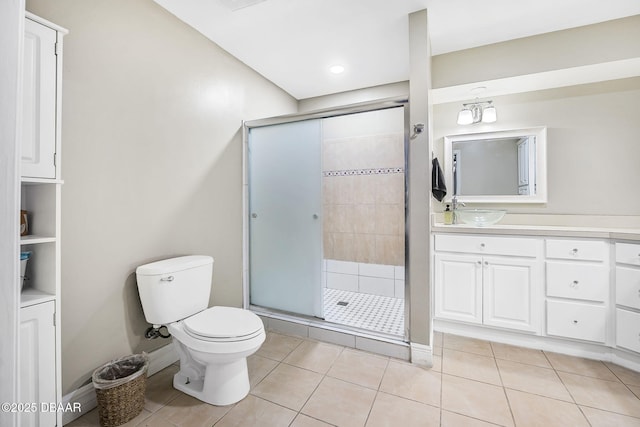 full bath with a stall shower, tile patterned floors, and toilet