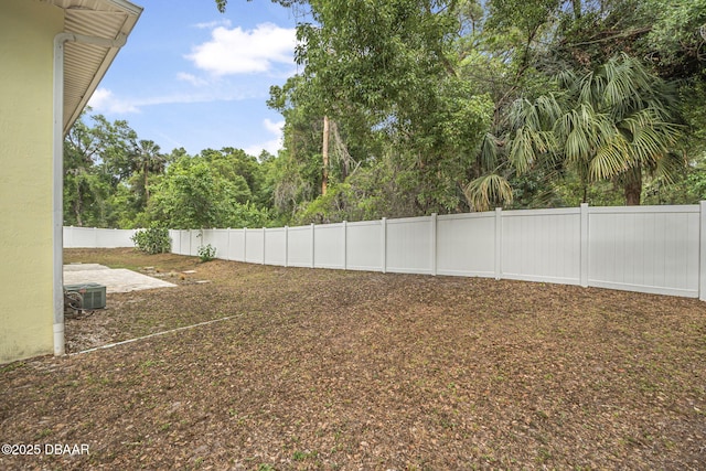 fenced backyard featuring a patio