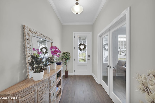 entryway featuring a wealth of natural light, baseboards, dark wood-style floors, and ornamental molding