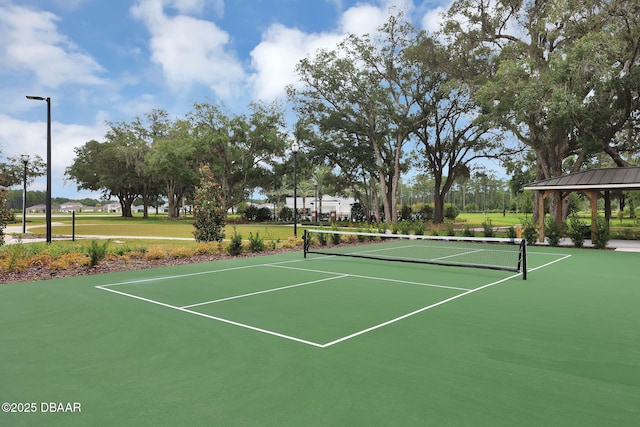 view of sport court featuring a gazebo