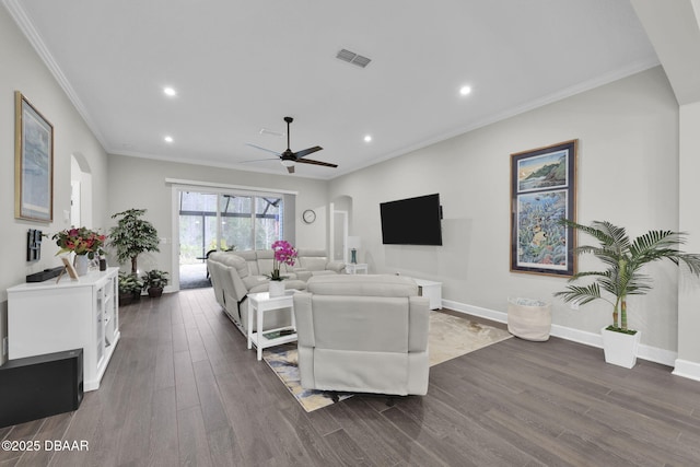 living room featuring visible vents, crown molding, baseboards, recessed lighting, and dark wood-style floors