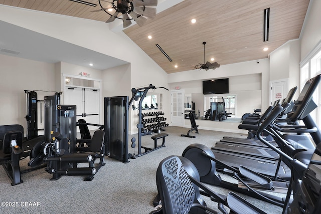 gym featuring a ceiling fan, visible vents, carpet floors, high vaulted ceiling, and wood ceiling