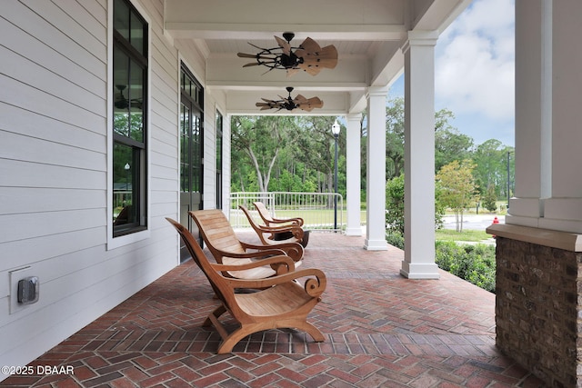 view of patio / terrace featuring a ceiling fan and covered porch