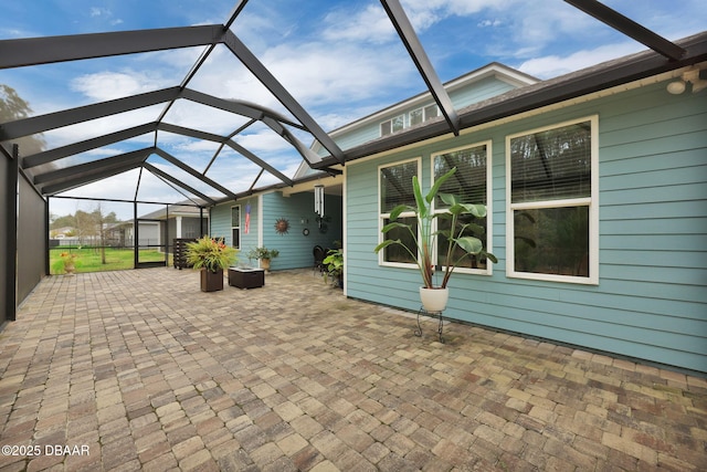 view of patio / terrace with glass enclosure