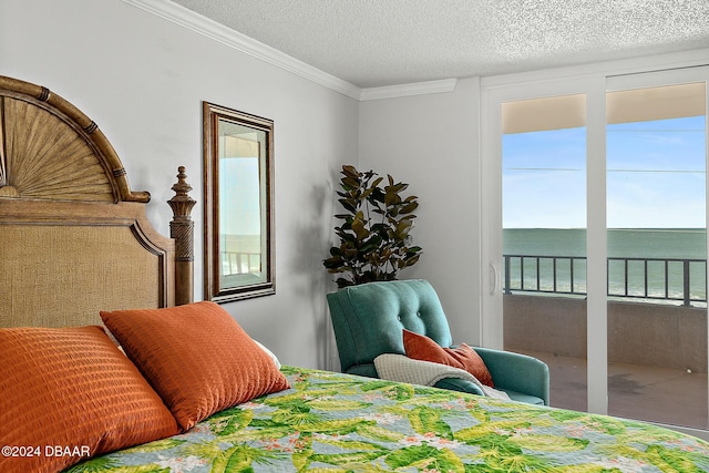 3370 Ocean Shore Blvd Unit 404B, Ormond Beach, FL 32176 - bedroom with a water view, crown molding, and a textured ceiling