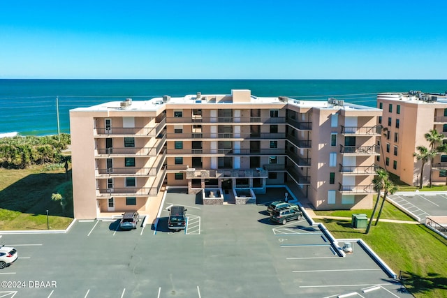 view of property with a water view