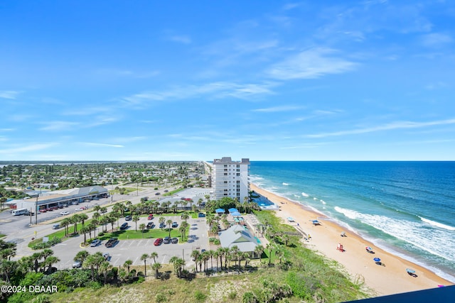 drone / aerial view with a view of the beach and a water view