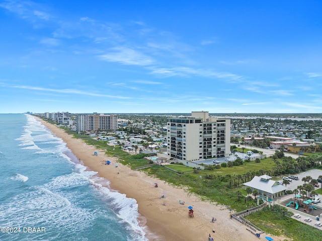 aerial view featuring a view of the beach and a water view