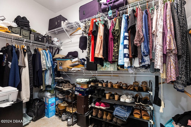 spacious closet with tile patterned flooring