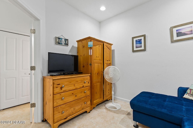 sitting room with light tile patterned floors