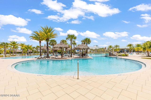 view of pool featuring a gazebo and a patio area