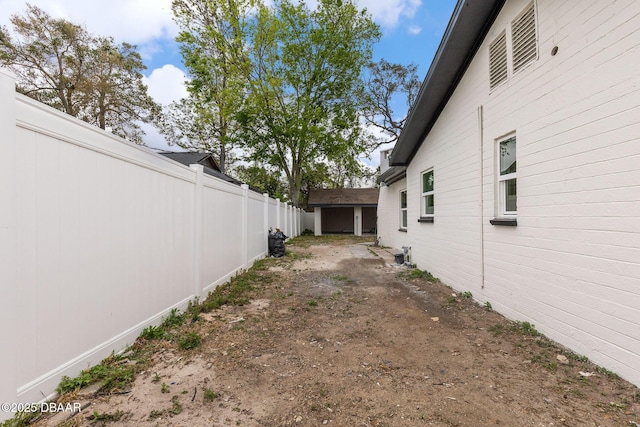 view of yard featuring fence