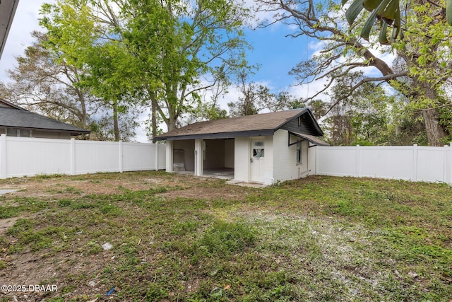 view of yard with a fenced backyard