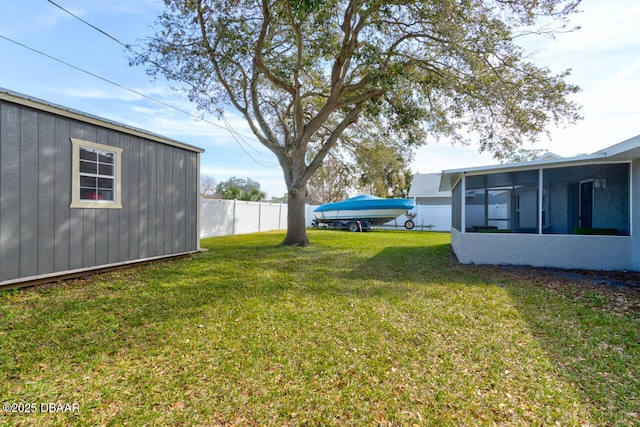 view of yard featuring a sunroom