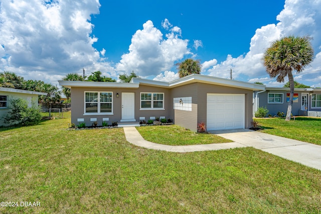 ranch-style house with a garage and a front yard