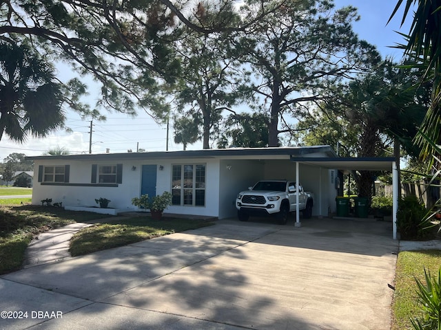 view of front of house featuring a carport