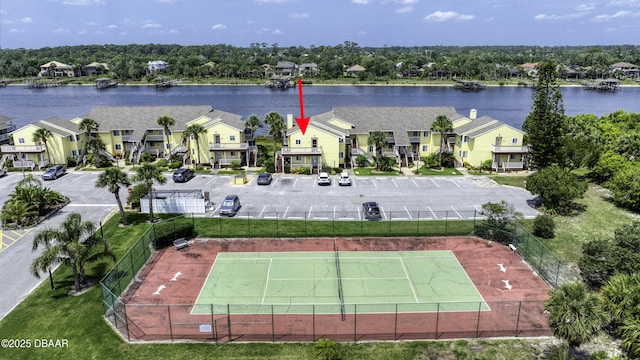 1101 Ocean Marina Dr Unit 201, Flagler Beach, FL 32136 - aerial view of residential area featuring a nearby body of water and a tree filled landscape