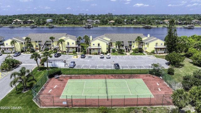 1101 Ocean Marina Dr Unit 201, Flagler Beach, FL 32136 - aerial view of residential area featuring a nearby body of water and a tree filled landscape