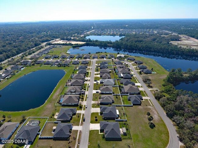 aerial view featuring a water view and a residential view