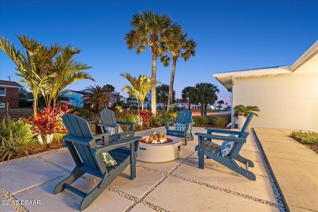 view of patio / terrace with a fire pit