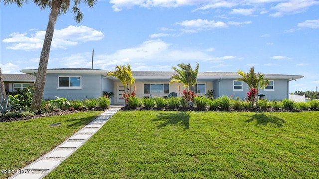 single story home with a front yard