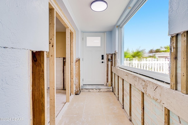 doorway to outside with a wealth of natural light