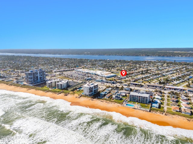 aerial view with a view of the beach and a water view