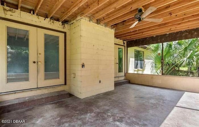 view of patio with french doors and ceiling fan