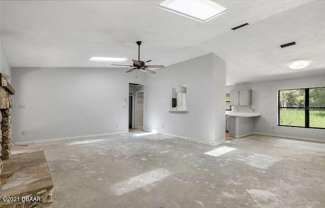 21305 86th Ave, Micanopy, FL 32667 - unfurnished living room featuring vaulted ceiling and a ceiling fan