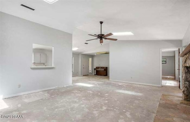 unfurnished living room with lofted ceiling and ceiling fan