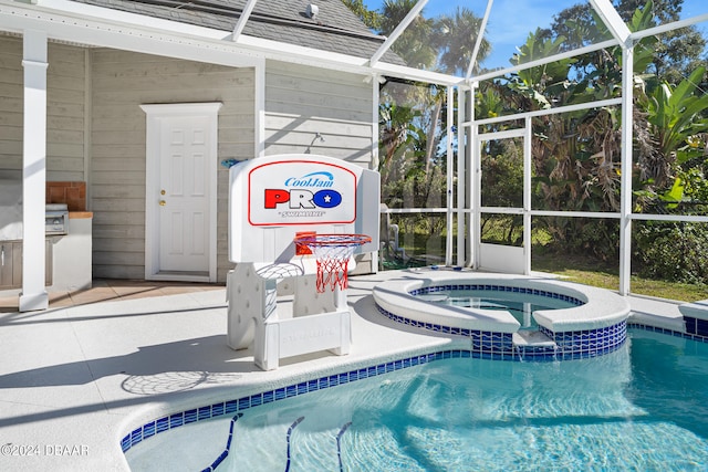 view of swimming pool featuring a lanai and an in ground hot tub