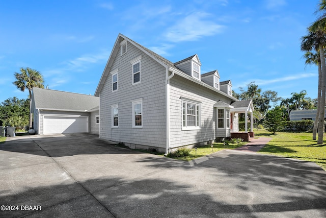 view of side of property with a yard