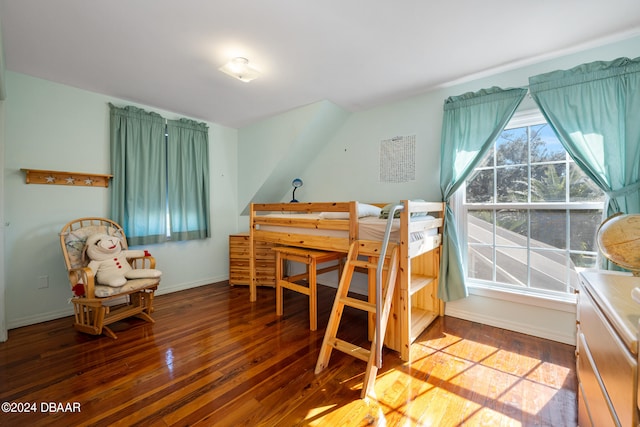 bedroom with hardwood / wood-style floors