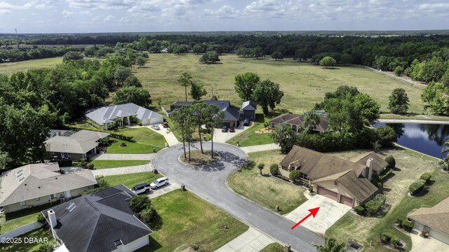 aerial view with a residential view and a water view