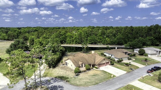 bird's eye view featuring a view of trees