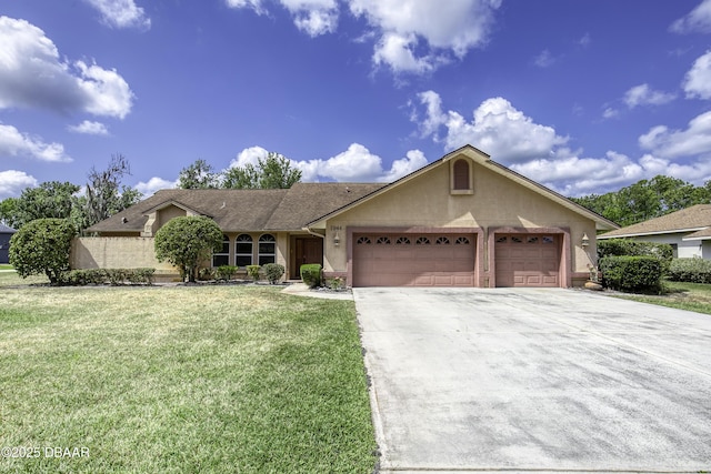 ranch-style home with a garage, stucco siding, driveway, and a front yard