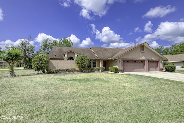 ranch-style home featuring a garage, stucco siding, and a front yard