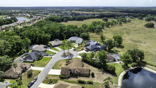 aerial view with a residential view and a water view