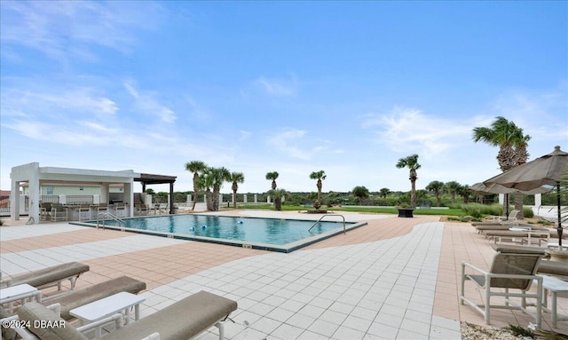 view of pool featuring a patio area