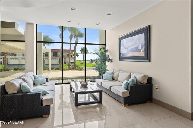 living room with a wall of windows