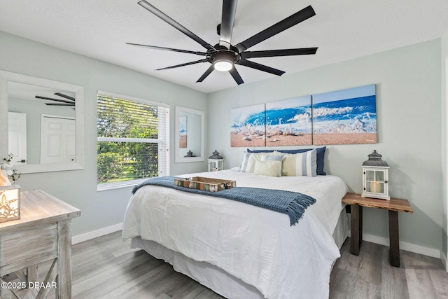 30 Bay Ct, Ormond Beach, FL 32174 - bedroom with wood finished floors and a ceiling fan
