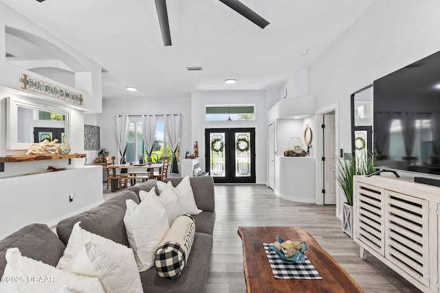 30 Bay Ct, Ormond Beach, FL 32174 - living area featuring wood finished floors, french doors, and recessed lighting