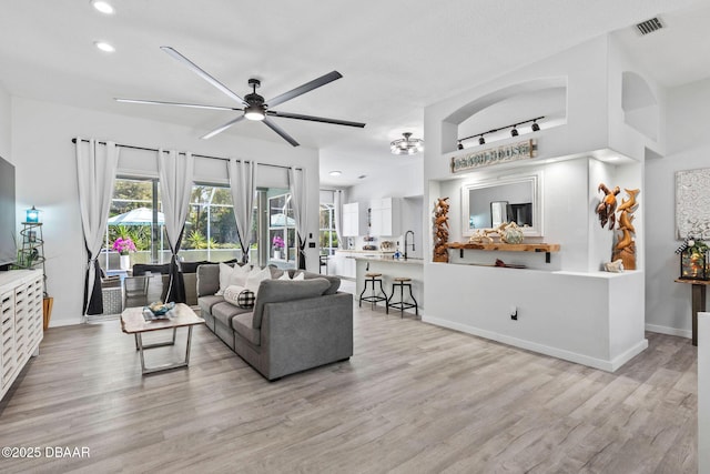 30 Bay Ct, Ormond Beach, FL 32174 - living area featuring a ceiling fan, wood finished floors, and recessed lighting