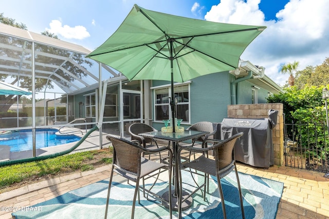 30 Bay Ct, Ormond Beach, FL 32174 - view of patio / terrace featuring a grill, a lanai, and outdoor dining space