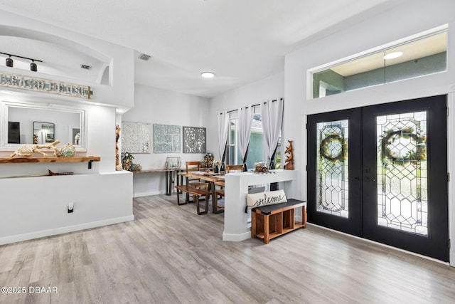 30 Bay Ct, Ormond Beach, FL 32174 - entryway with wood finished floors, french doors, plenty of natural light, and recessed lighting