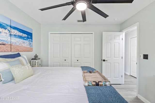 30 Bay Ct, Ormond Beach, FL 32174 - bedroom featuring wood finished floors, a closet, and ceiling fan