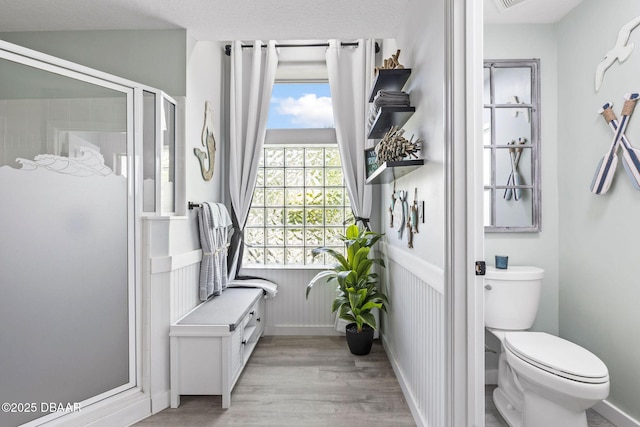 30 Bay Ct, Ormond Beach, FL 32174 - bathroom with a stall shower and wood finished floors