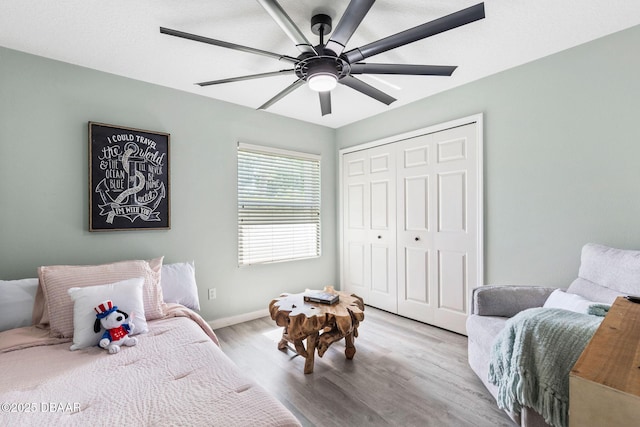 30 Bay Ct, Ormond Beach, FL 32174 - bedroom featuring light wood-style floors, a closet, and a ceiling fan